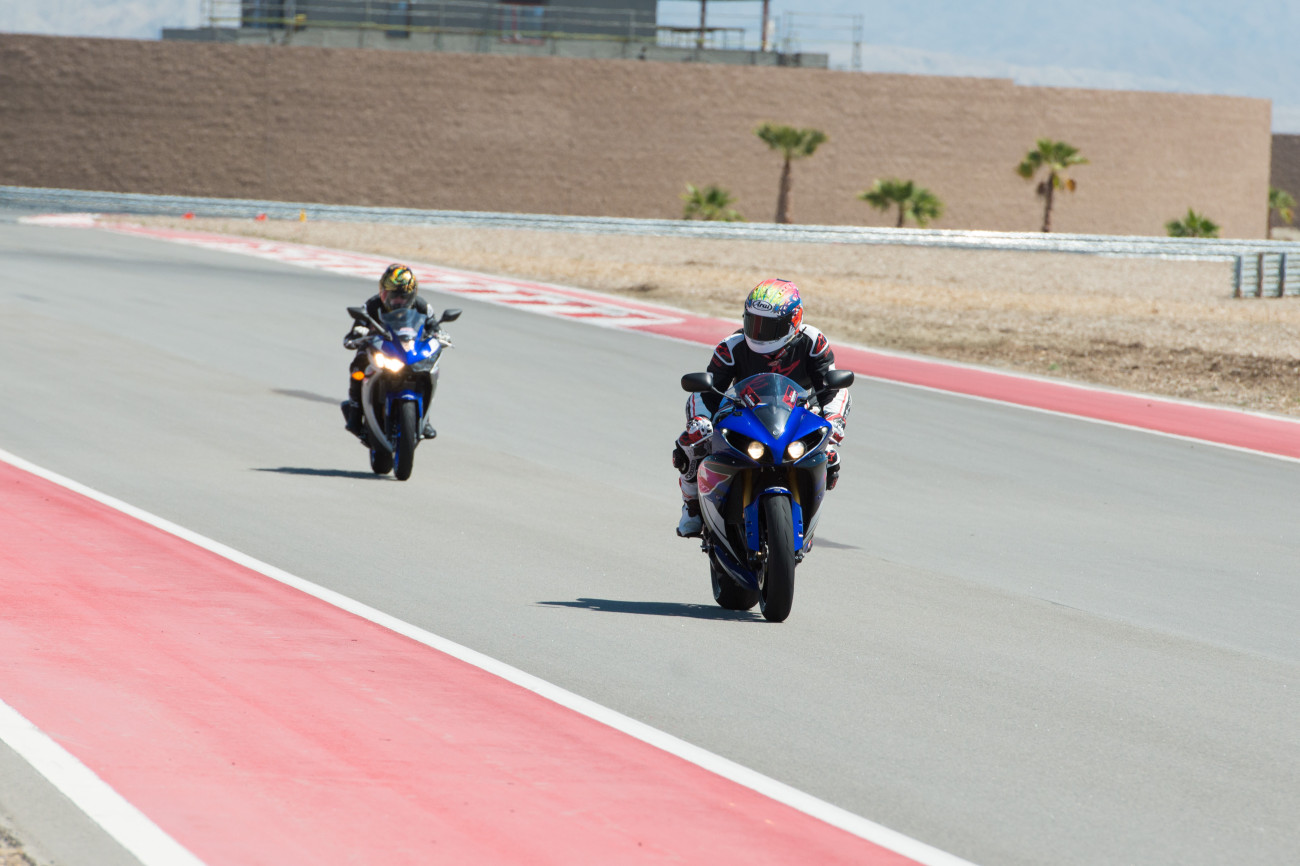 Alicia Elfving of MotoLady on track with Keith Culver of Yamaha Champions Riding School